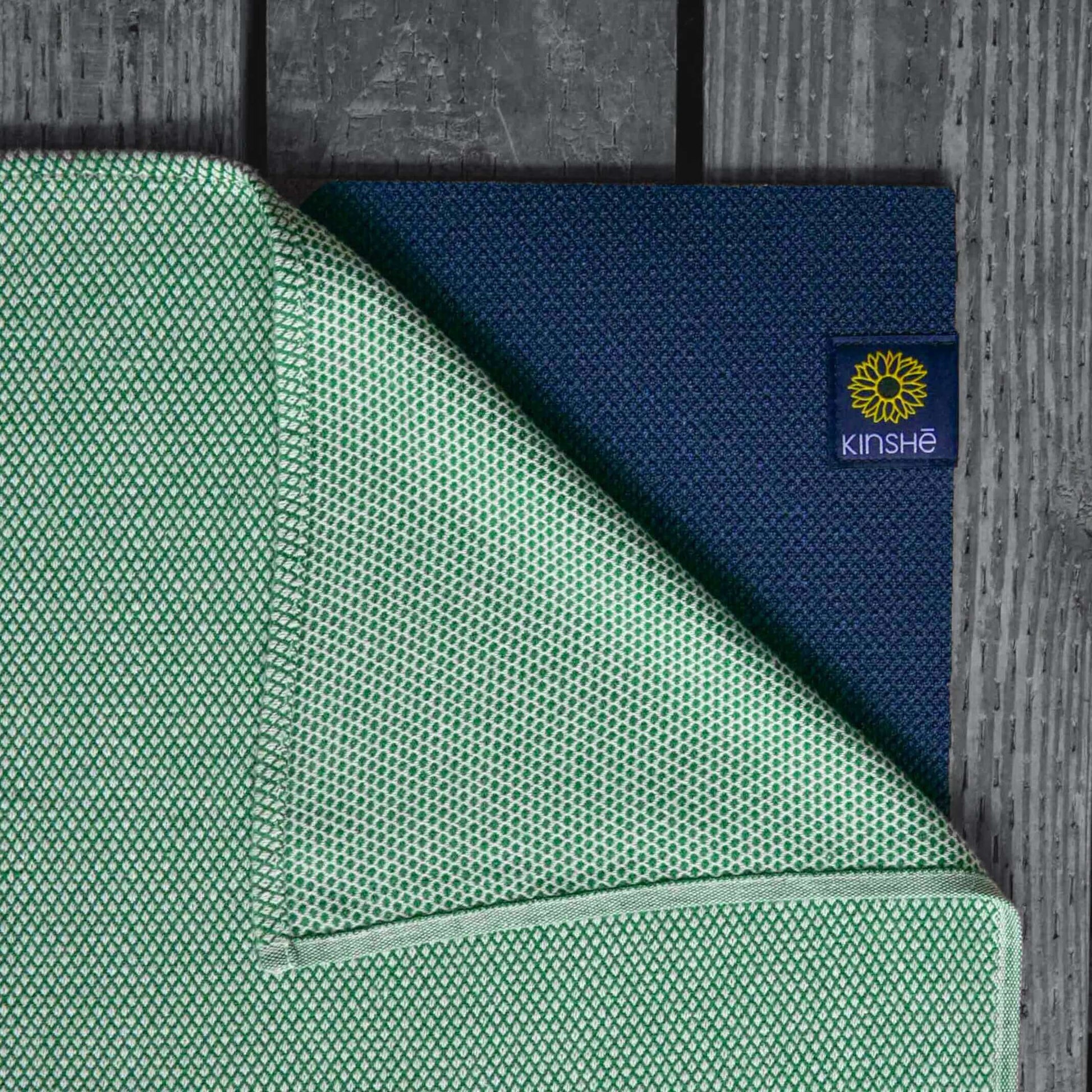 A jewel forest green color swatch of Kinshe Yoga's 100 % premium Turkish cotton yoga towel. Sold as the "Earthtowel," it's strong, absorbent and green certified by Oeko-Tex. This yoga towel doubles as a soft meditation blanket.