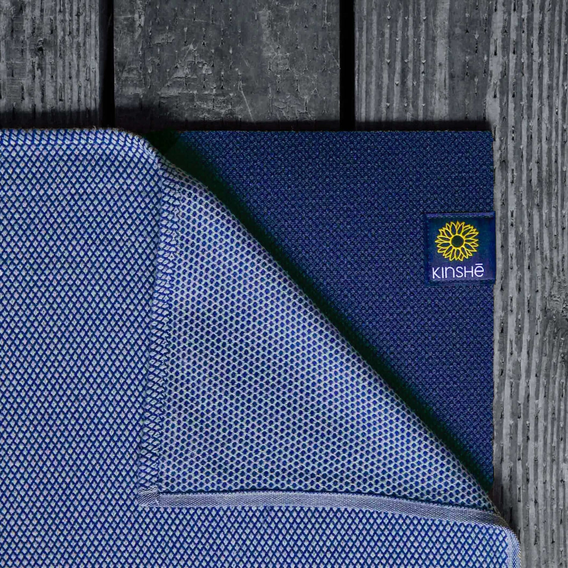 A Neptune blue color swatch of Kinshe Yoga's 100 % premium Turkish cotton yoga towel. Sold as the "Earthtowel," it's strong, absorbent and green certified by Oeko-Tex. This yoga towel doubles as a soft meditation blanket. 